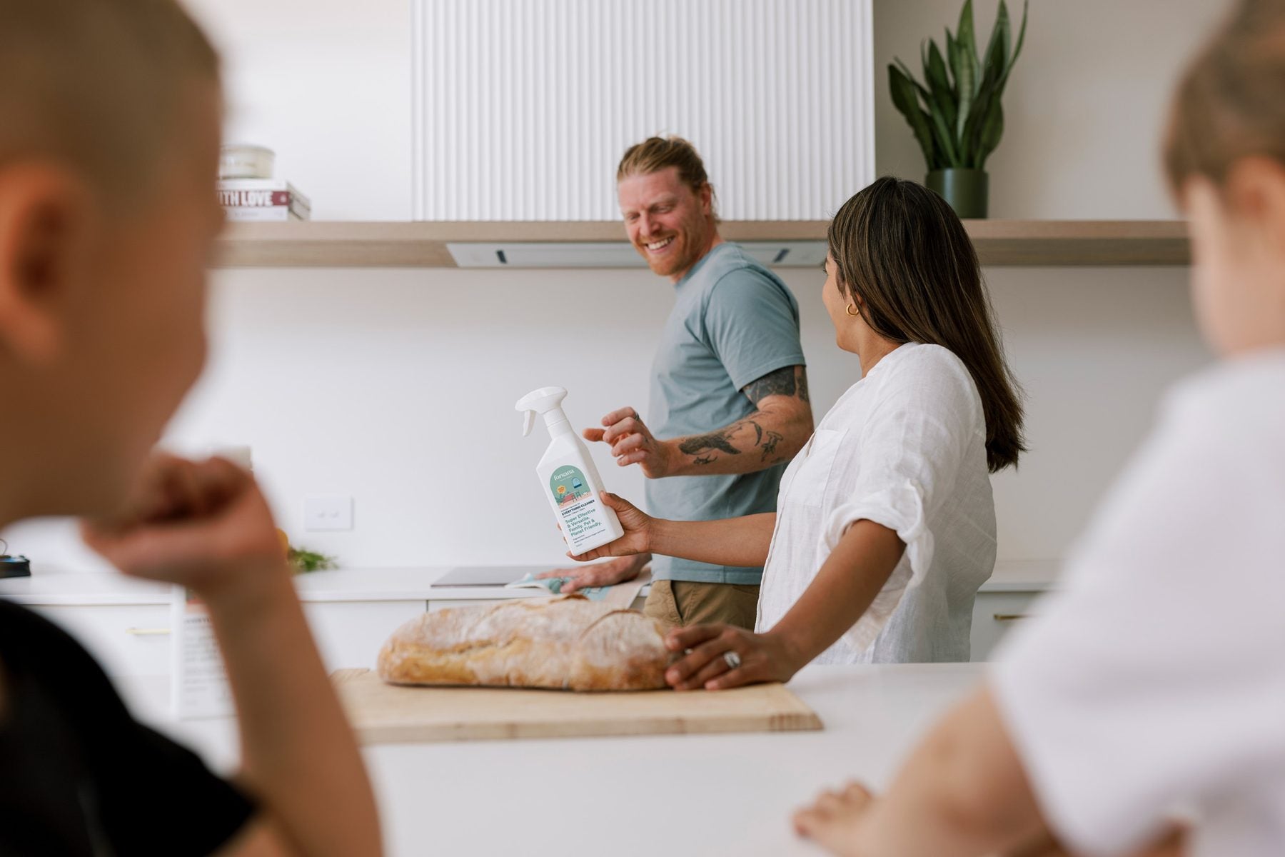 A family in the kitchen with Forsana Everything Cleaner