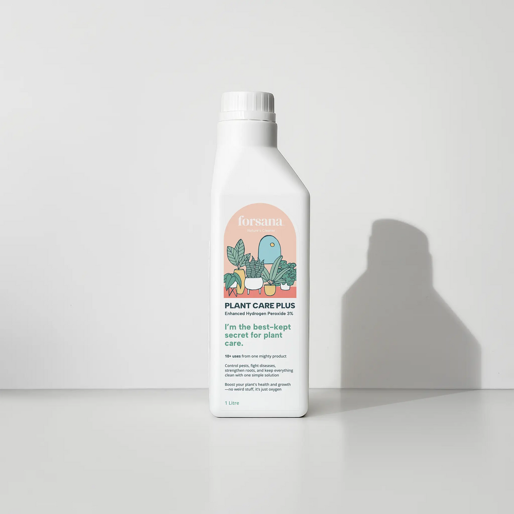 Forsana Plant Care Plus bottleattached to a reusable Mister 360spray nozzle.